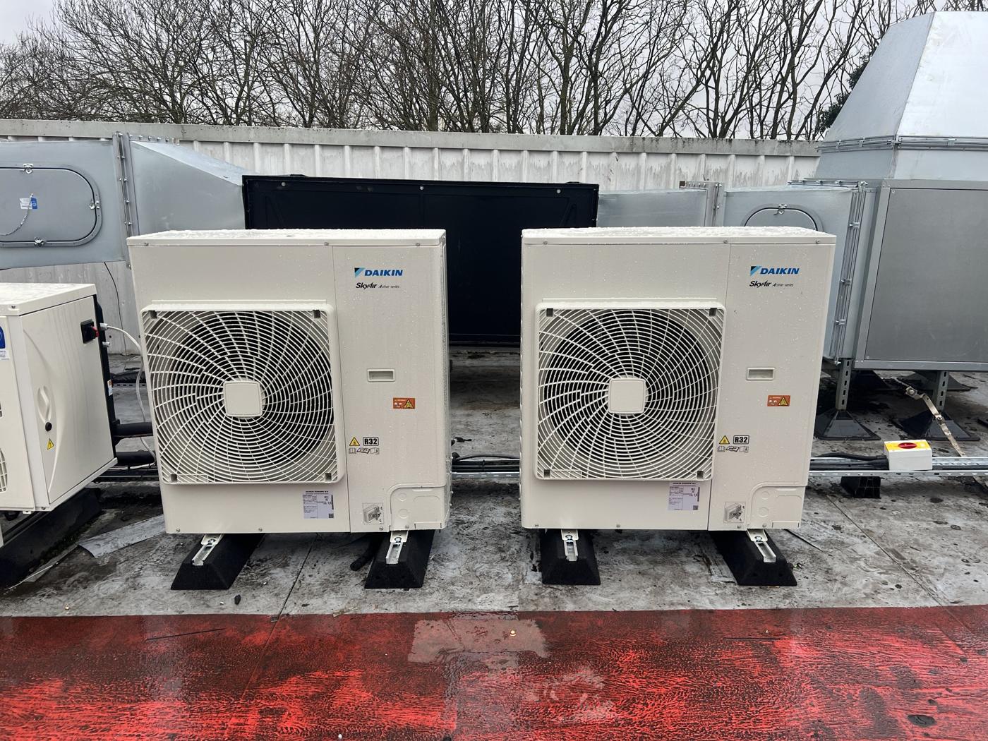 Daikin SkyAir outdoor units on anti vibration roof supports