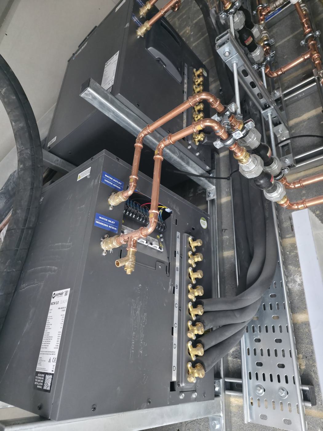 Branch controller with brazed copper headers on unistrut supports