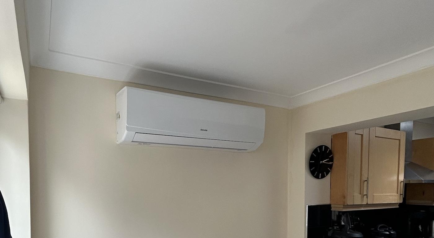 Wall mounted unit in a kitchen diner, pipework concealed